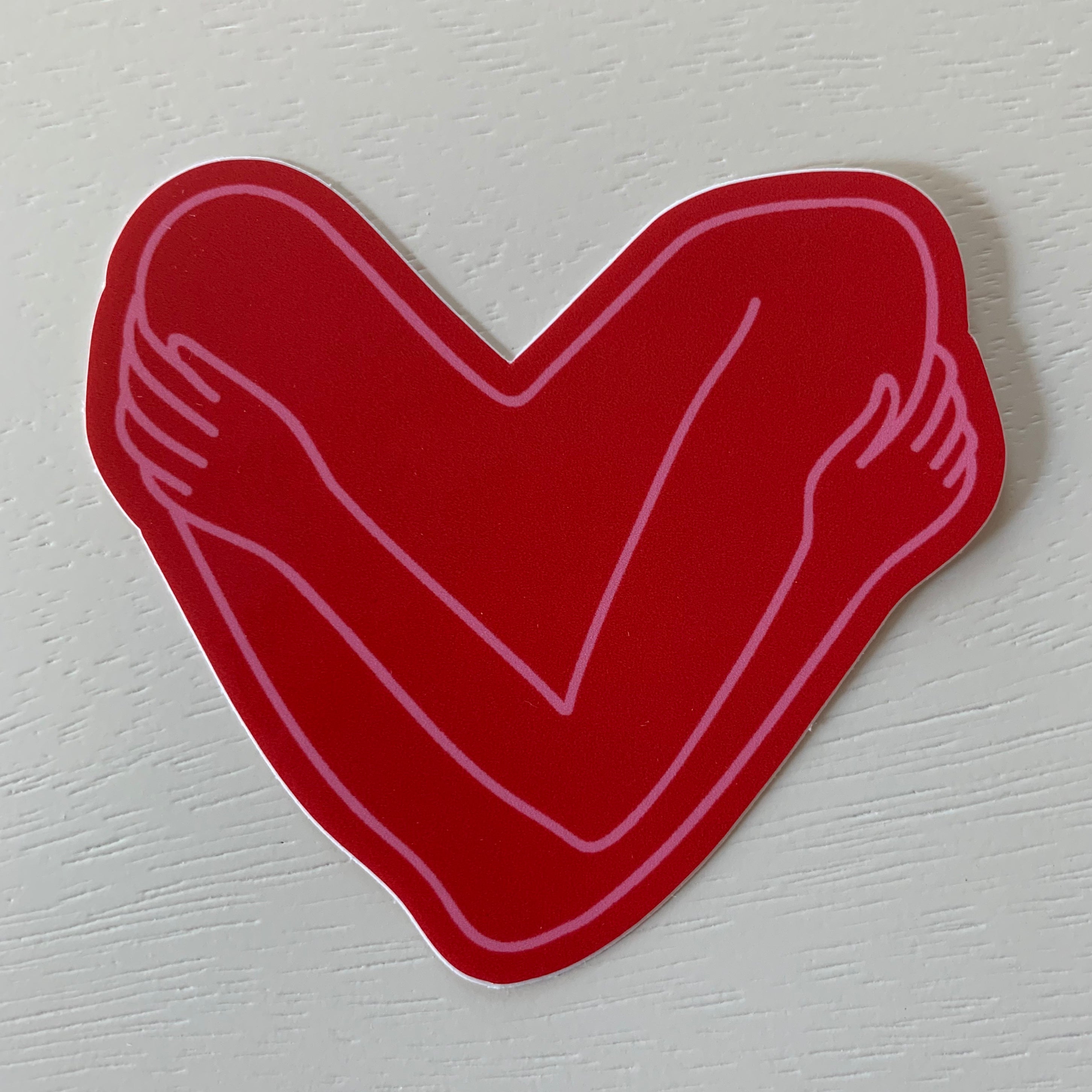 Heart Held Sticker